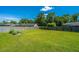 Fenced backyard with lush green grass and a raised garden at 127 Rahway Rd, Goose Creek, SC 29445