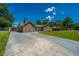 Beautifully landscaped home with a wide driveway, offering ample parking space and curb appeal at 127 Rahway Rd, Goose Creek, SC 29445