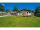 Lovely single-story home with a spacious lawn and mature trees in a serene setting at 127 Rahway Rd, Goose Creek, SC 29445