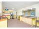 Kitchen featuring a breakfast bar and stainless steel refrigerator at 127 Rahway Rd, Goose Creek, SC 29445