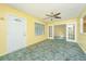 Bright living room with large windows and glass doors, offering seamless access to other living areas at 127 Rahway Rd, Goose Creek, SC 29445
