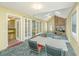 Inviting living room featuring a brick fireplace, skylights, and access to additional rooms at 127 Rahway Rd, Goose Creek, SC 29445