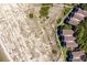 An aerial view shows the complex is near a beach and has wooden walkways at 1334 Pelican Watch Villas, Seabrook Island, SC 29455