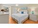 Serene bedroom with a queen bed, soft lighting, and a door leading to the outdoor space at 1334 Pelican Watch Villas, Seabrook Island, SC 29455