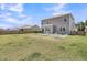 Spacious backyard with a well-maintained lawn and a wooden fence, perfect for outdoor activities at 134 Ivory Shadow Rd, Summerville, SC 29486