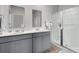 Bathroom features double sinks, with modern fixtures and a glass enclosed shower for a spa-like experience at 134 Ivory Shadow Rd, Summerville, SC 29486