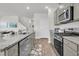 Contemporary kitchen with granite countertops, stainless appliances, and ample cabinet space at 134 Ivory Shadow Rd, Summerville, SC 29486
