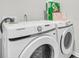 Modern laundry room features new Samsung washer and dryer, with organized storage space above at 134 Ivory Shadow Rd, Summerville, SC 29486