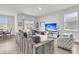 Comfortable living room featuring a plush sofa, stylish chairs, and a view of the backyard at 134 Ivory Shadow Rd, Summerville, SC 29486
