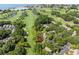 Bird's eye view featuring golf course homes sheltered by mature trees, with ocean scenery at 146 High Hammock Villas, Seabrook Island, SC 29455