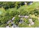 Aerial view showcases property next to the golf course surrounded by mature trees at 146 High Hammock Villas, Seabrook Island, SC 29455