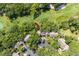 Aerial view showcases property next to the golf course surrounded by mature trees at 146 High Hammock Villas, Seabrook Island, SC 29455