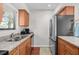 Well-equipped kitchen with stainless steel appliances, granite counters, and functional layout at 146 High Hammock Villas, Seabrook Island, SC 29455