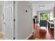 Bright living room featuring beautiful hardwood floors and an open floor plan to a cozy sitting area at 146 High Hammock Villas, Seabrook Island, SC 29455