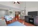 Bright living room with high ceilings, hardwood floors, and comfortable seating area at 146 High Hammock Villas, Seabrook Island, SC 29455