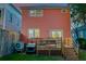 Backyard with a wooden deck provides a great space for enjoying the outdoors at 15 Dewey St, Charleston, SC 29403