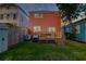 Large backyard featuring a wooden deck, providing a great space for outdoor activities and relaxation at 15 Dewey St, Charleston, SC 29403