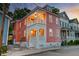 Charming two-story home with a covered porch and classic architectural details at 15 Dewey St, Charleston, SC 29403