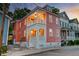 Charming two-story home with a covered porch and classic architectural details at 15 Dewey St, Charleston, SC 29403