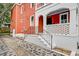 Charming two-story home with an inviting front porch and walkway at 15 Dewey St, Charleston, SC 29403