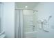 Bathroom featuring a shower/tub with a white shower curtain and towel rack at 1529 Foster Creek Rd, Hanahan, SC 29410