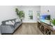 Modern living room with stylish furniture and bright natural light at 1529 Foster Creek Rd, Hanahan, SC 29410