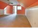 Well lit spacious attic featuring a ceiling fan, large window and neutral walls at 153 Willow Brook Way, Cordesville, SC 29434