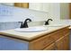 Bathroom featuring a double vanity with decorative mirrors and modern fixtures at 153 Willow Brook Way, Cordesville, SC 29434