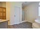 Bathroom with tiled floors, shower, jacuzzi tub, vanity, and natural light at 153 Willow Brook Way, Cordesville, SC 29434