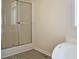 Bathroom featuring a glass shower enclosure with modern fixtures and tile flooring at 153 Willow Brook Way, Cordesville, SC 29434