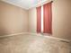 Cozy bedroom featuring neutral walls, carpeted floor and red curtains at 153 Willow Brook Way, Cordesville, SC 29434