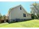 Exterior view of the house showcasing the deck and well-maintained lawn at 153 Willow Brook Way, Cordesville, SC 29434