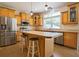 A full kitchen shot shows a large island, stainless steel appliances, and plenty of counter space at 153 Willow Brook Way, Cordesville, SC 29434