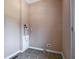Functional laundry room featuring tile flooring, washer hookups, and wall outlets at 153 Willow Brook Way, Cordesville, SC 29434