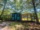 An outdoor enclosed structure with shelter for animals and foliage at 153 Willow Brook Way, Cordesville, SC 29434