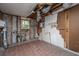 Exposed Basement with tiled floor, exposed piping and cinder block walls at 1612 Evergreen St, Charleston, SC 29407