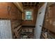 Bathroom under construction with exposed wood and damaged floor at 1612 Evergreen St, Charleston, SC 29407
