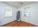 Bright bedroom with windows offering natural light and wood floors at 1612 Evergreen St, Charleston, SC 29407