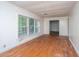 Sun-filled living room boasts hardwood floors and open layout at 1612 Evergreen St, Charleston, SC 29407