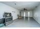 View of the living area that includes an appliance, comfortable seating, and natural light creating an inviting renovation space at 1612 Evergreen St, Charleston, SC 29407