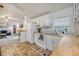 Functional kitchen with white appliances, wood countertops, and an open view to the adjacent living area at 1617 Refuge Run, Charleston, SC 29412