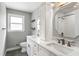 This bathroom has double sinks, marble countertops and a large mirror at 1789 Balfoure Dr, Charleston, SC 29407