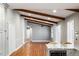 Open concept living room and kitchen with vaulted ceiling and exposed beams at 1789 Balfoure Dr, Charleston, SC 29407