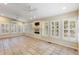 Well-lit sunroom with tile floors, multiple windows with shutters, and ceiling fans for added comfort at 1789 Balfoure Dr, Charleston, SC 29407