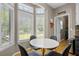 Bright eat-in kitchen area filled with lots of natural light and white countertops at 2005 Thornhill Dr, Summerville, SC 29485