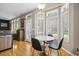 Bright kitchen featuring hardwood floors, modern table, and ample natural light at 2005 Thornhill Dr, Summerville, SC 29485