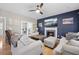 Comfortable living room features a fireplace, plush seating and light-filled windows at 2005 Thornhill Dr, Summerville, SC 29485