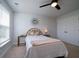 Cozy bedroom with neutral decor, complemented by plush bedding and carpet at 2017 Geranium Ln, Johns Island, SC 29455