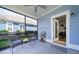 Relaxing screened porch with comfortable seating, offering a peaceful outdoor living space at 2017 Geranium Ln, Johns Island, SC 29455