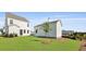 Spacious backyard features a storage shed and lush green lawn, perfect for outdoor activities and relaxation at 212 Terrace View Dr, Summerville, SC 29486